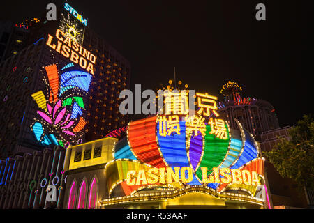 Casino Lisboa main entrance illuminated by neon lights is a popular landmark and tourist attraction in Macau. Macau, January 2018 Stock Photo