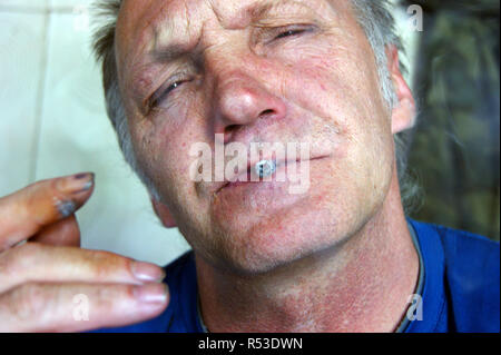 Person men smoking cigarette Stock Photo - Alamy