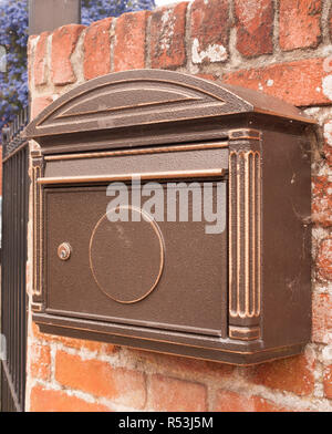 an old fashioned post box outside on the wall cool Stock Photo