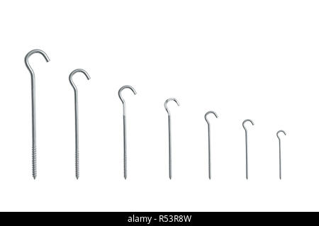 Metal hooks screws of different sizes. White isolate Stock Photo