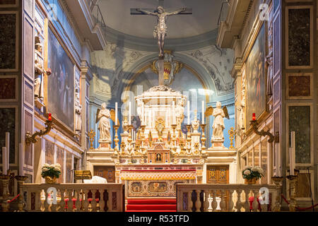 Altar with crucifix in Chiesa di Ognissanti church in Florence, Italy Stock Photo