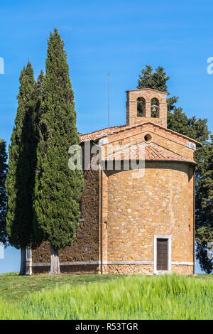 Chapel with cypress trees in Tuscany, Italy Stock Photo