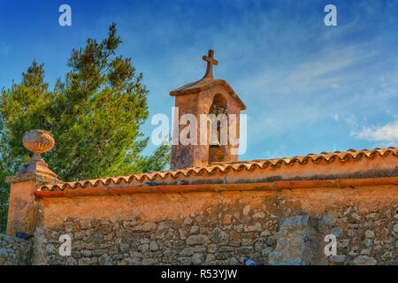 church tower with bell in the spanish style Stock Photo