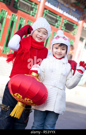 Children holding red lantern Stock Photo