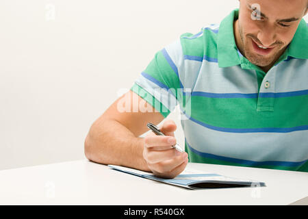 Man doing puzzle Stock Photo