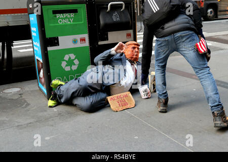 New York City, New York, USA. 29th Nov, 2018. Seen on Wall Street, the heart of American capitalism, was an American patriot doing his part in funding Donald Trump's southern border wall on 29 November 2018. Credit: G. Ronald Lopez/ZUMA Wire/Alamy Live News Stock Photo