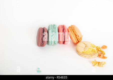 Colorful macarons cakes. Small French cakes. Sweet and colorful french macaroons on white background,high angle view  with copy space Stock Photo