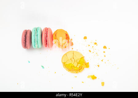 Colorful macarons cakes. Small French cakes. Sweet and colorful french macaroons on white background,high angle view  with copy space Stock Photo