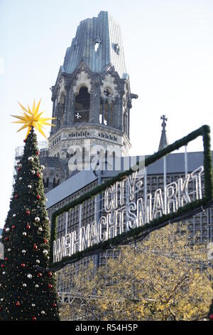 Berlin, Germany. 28th Nov, 2018. Berlin: A fir tree at the entrance of the Christmas market on the Breitscheidplatz. Credit: Simone Kuhlmey/Pacific Press/Alamy Live News Stock Photo