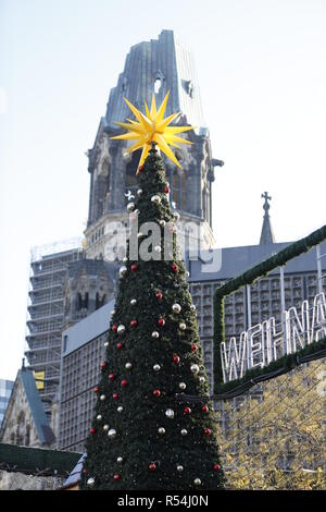 Berlin, Germany. 28th Nov, 2018. Berlin: A fir tree at the entrance of the Christmas market on the Breitscheidplatz. Credit: Simone Kuhlmey/Pacific Press/Alamy Live News Stock Photo