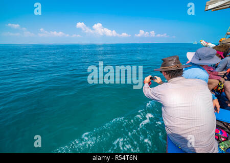 A tourist explores Santa Carolina Island, Bazaruto archipelago Mozambique. Stock Photo