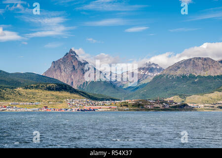 Panoramic view of Ushuaia and Tierra del Fuego mountains from Beagle Channel, Argentina Stock Photo