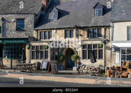 View of The Mermaid Inn, High Street, Burford, Oxfordshire in the autumn Stock Photo