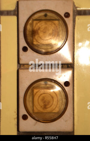 old and dirty light switches with plastic cover protected against moisture and wet, old electrical light switches Stock Photo