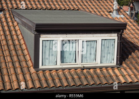 Roof window with roller shutter . Stock Photo