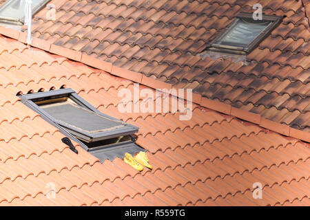 Roof window with roller shutter . Stock Photo