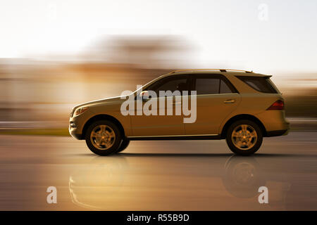 3D rendering of a fast moving SUV Stock Photo