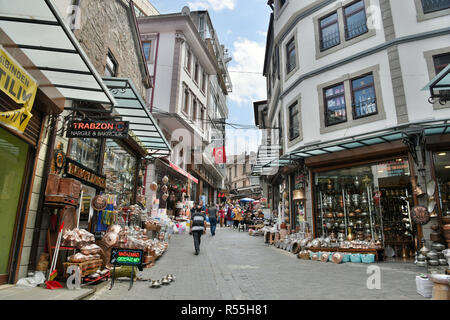 Trabzon, Turkey - September 8, 2018. Street view in the bazaar district of Trabzon, with commercial properties and people. Stock Photo