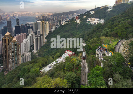 The Peak Tram approaching Victoria Peak, with Lion's Pavilion lookout on the right, Hong Kong Stock Photo