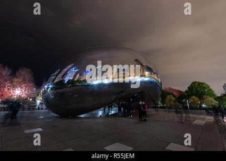 Cloud Gate, nicknamed 'Bean,' is located on Michigan Avenue within the cities Millennium Park, which features art, music, and theater to the public. Stock Photo