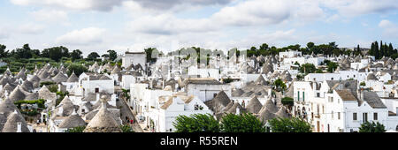 Wide panormic view of Alberobello with the famous trulli houses, an UNESCO World Heritage Site, Apulia, Italy Stock Photo