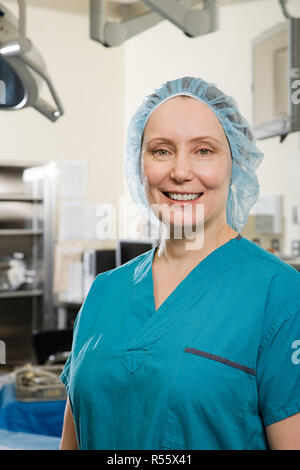 Surgeon in operating theatre Stock Photo