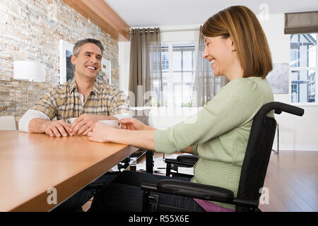 Disabled woman with her partner Stock Photo