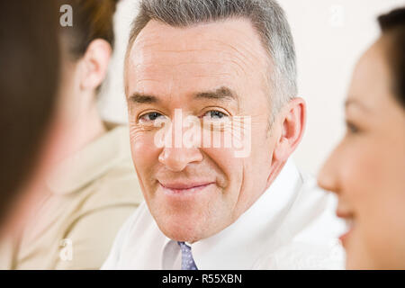 Mature businessman in a meeting Stock Photo