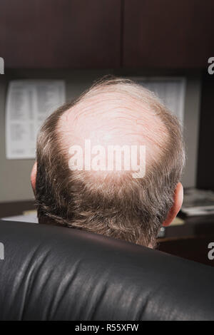 Mature businessman with bald head Stock Photo