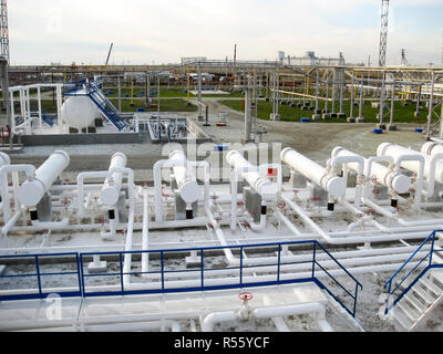 Heat exchangers in a refinery. The equipment for oil refining Stock Photo