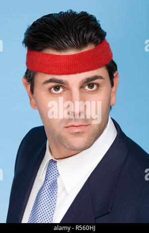 Businessman wearing a sweatband Stock Photo
