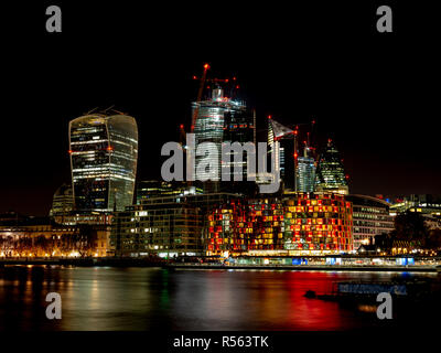 City of London at Night, one of the leading centers of global finance. This view includes Tower 42 Gherkin,Willis Building, Stock Exchange Tower Stock Photo