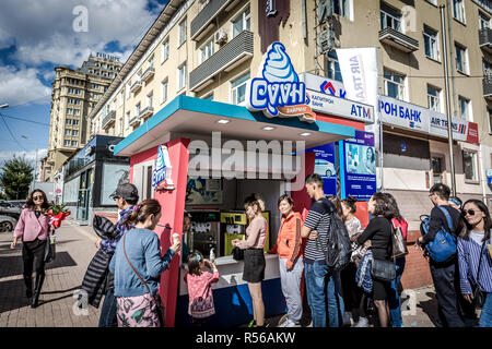 Ulaanbaatar, Mongolia - Sep 9th 2018 - Local people lining to buy an ice cream in Ulaanbaatar in a summer mild day in Mongolia Stock Photo