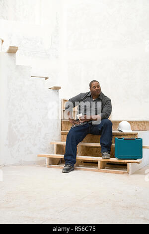 A builder taking a break Stock Photo
