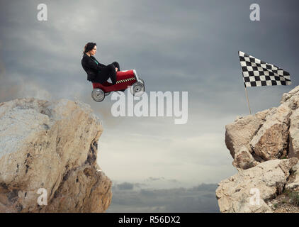 Fast businesswoman with a car wins against the competitors. Concept of success and competition Stock Photo