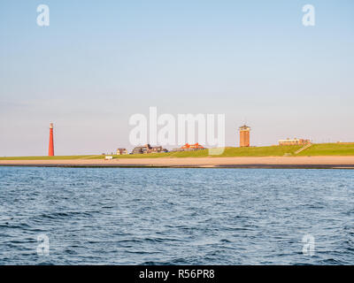 Lighthouse Lange Jaap at North Sea coast of Huisduinen near Den Helder, Netherlands Stock Photo