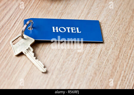 A hotel key with a tag on the table Stock Photo