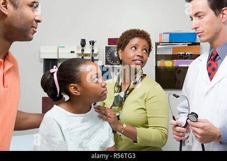Family listening to doctor Stock Photo