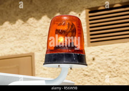 flashing emergency light siren mounted on a car Stock Photo