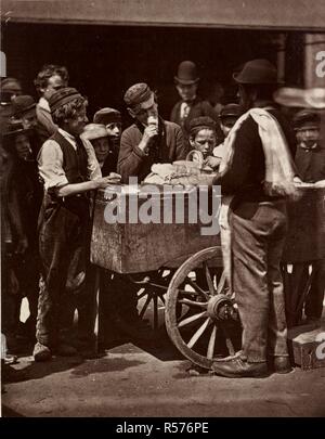 'Halfpenny ices: workers on the 'silent highway'. Street incidents. London, 1881. Woodburytypes. Source: RB.23.b.6198 plate 4. Author: THOMSON, JOHN. Stock Photo