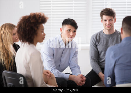 Multiracial Businesspeople In Meeting Stock Photo