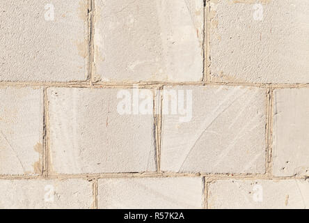 old wall of a building made of large silicate blocks, closeup Stock Photo