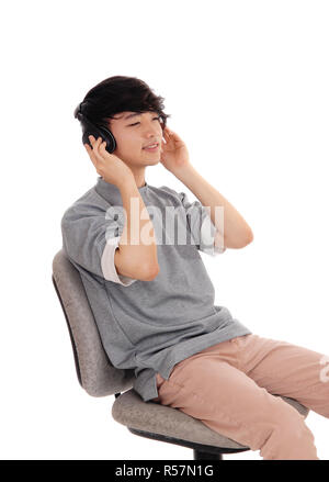 Asian man listen head phone. Stock Photo