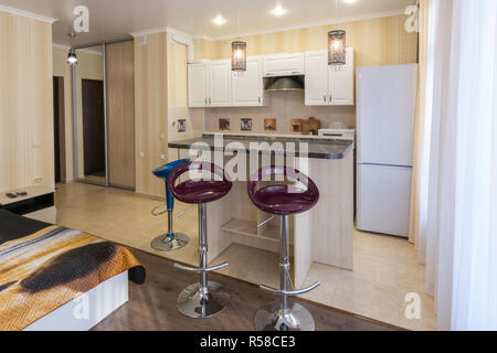 Interior studio apartments, view of the kitchen and the bar Stock Photo