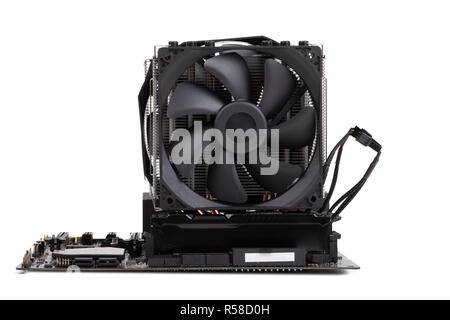 gaming PC mainboard - motherboard with installed CPU and Cooler with heat-pipes and ventilator fan for new processors 9th generation isolated on white Stock Photo