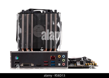 gaming PC mainboard - motherboard with installed CPU and Cooler with heat-pipes and ventilator fan for new processors 9th generation isolated on white Stock Photo