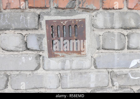 Old ventilation window on wall Stock Photo