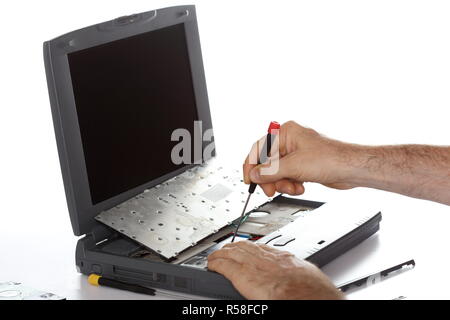 technician repairs notebook Stock Photo