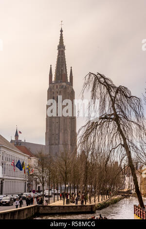 Belgium, Bruges, Brugge, a canal with church of our lady in the background Stock Photo