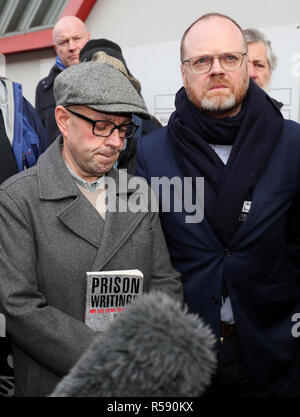 Journalists Barry McCaffrey (left) and Trevor Birney arrive Musgrave police station in Belfast for scheduled questioning over the theft of Police Ombudsman documentation on the Loughinisland massacre. Stock Photo